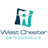 West Chester Orthodontics dark blue and aqua logo. Logo mark is a tooth with connected brace and wire.